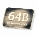 Tabliczka na dom z nazwą ulicy i numerem posesji