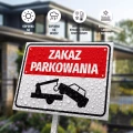 Tabliczka parkingowa: Zakaz parkowania, z symbolem odholowania
