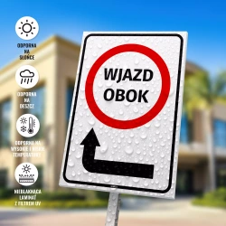 Tabliczka: Wjazd obok, strzałka w lewo