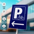Tabliczka parkingowa: Parking dla rowerów, strzałka w lewo