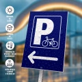 Tabliczka parkingowa: Parking dla rowerów, strzałka w lewo