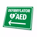 Tabliczka: defibrylator AED, strzałka w lewo