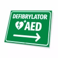 Tabliczka: defibrylator AED, strzałka w prawo
