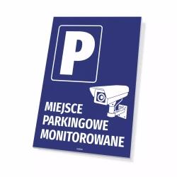 Tabliczka: Miejsce parkingowe monitorowane, kamera