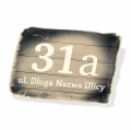Tabliczka na dom z nazwą ulicy i numerem posesji
