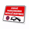 Tabliczka: zakaz parkowania wzdłuż budynku